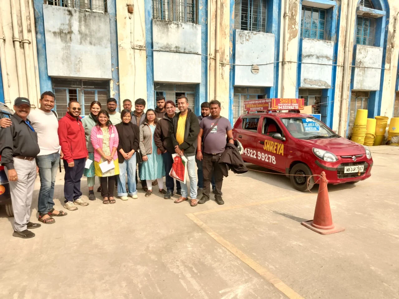 Training School group beside the Shreya car
